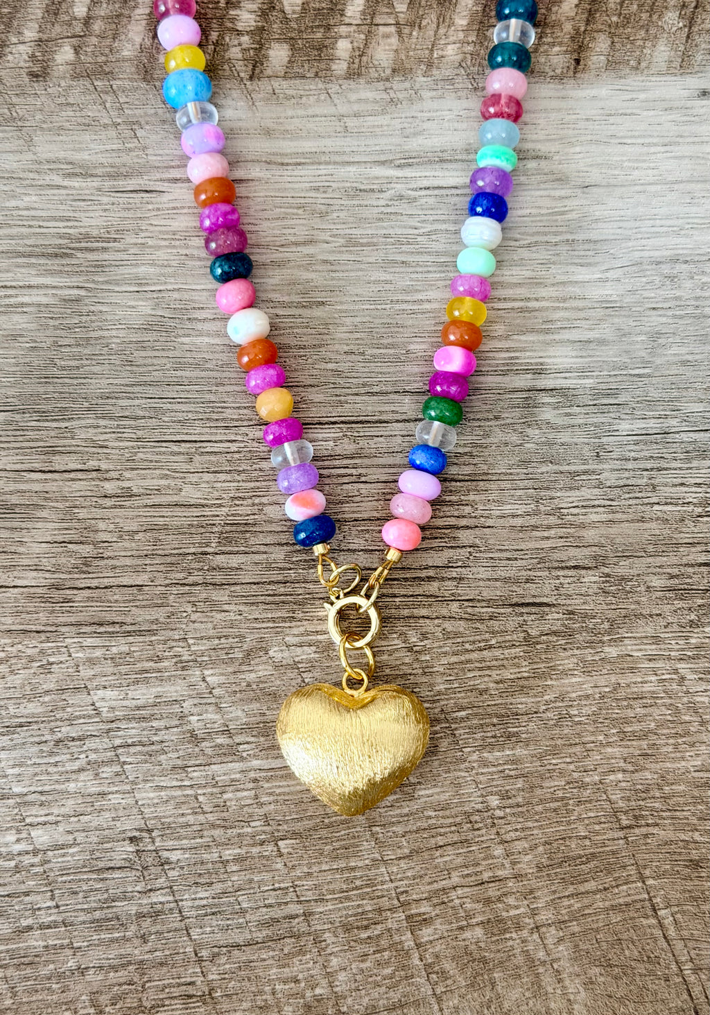 Colorful Claire Necklace: Mixed gemstones and a textured puffed heart pendant