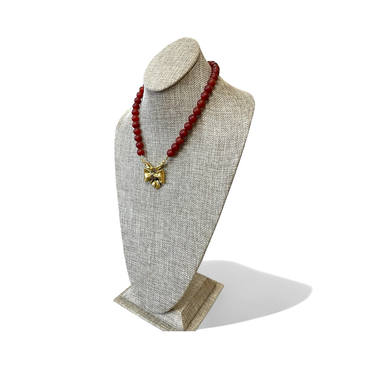 Matte Carnelian Bow Necklace: Matte Carnelian gemstone beads Antiqued gold bow pendant