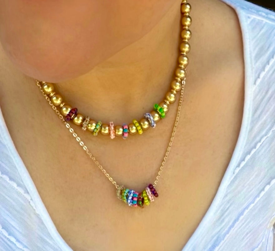 The Inner Circle Necklace: A Gold Filled diamond cut cable chain w/ mini glass bead circle charms