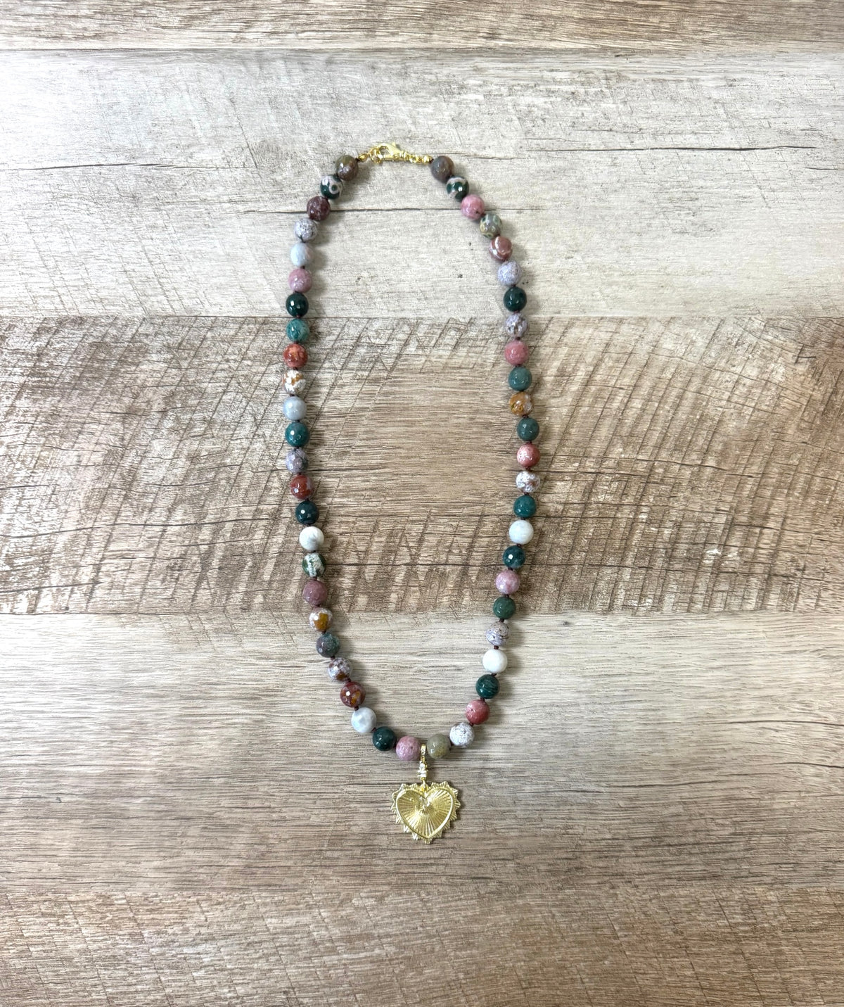 Heart & Soul Necklace: Faceted Ocean Jasper handknotted on deep burgundy. Removable gold heart