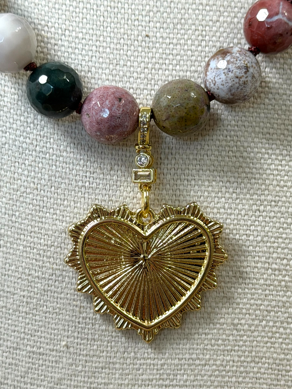 Heart & Soul Necklace: Faceted Ocean Jasper handknotted on deep burgundy. Removable gold heart