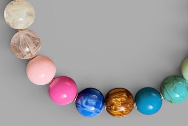 The Gathered Color Necklace: multi color intricate beads with a tiny pop of gold