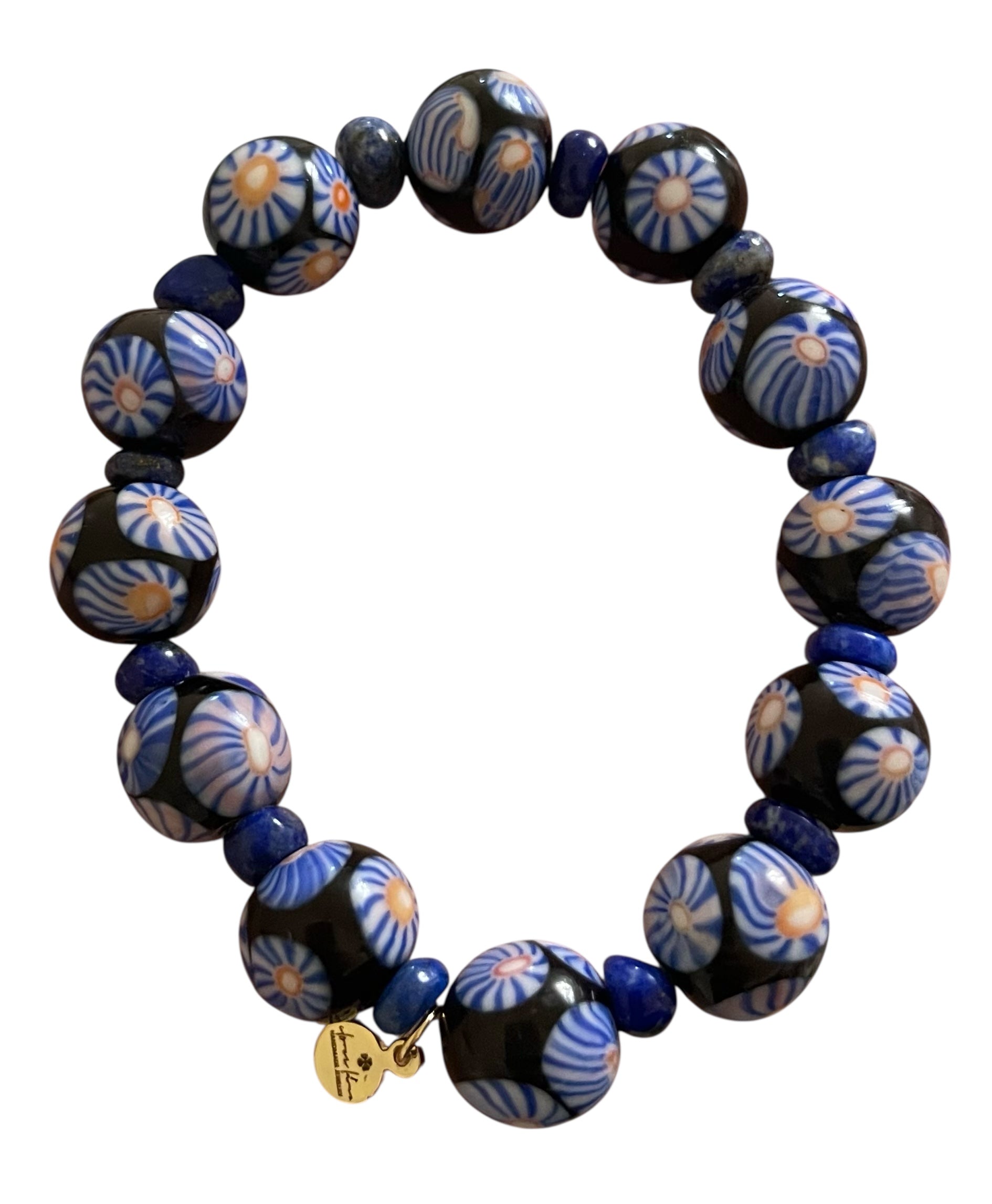 Midnight Bloom Bracelet: Hand patterned Millifiori Javanese Glass beads on Stretch elastic cord, Lapis Lazuli spacer beads OOAK