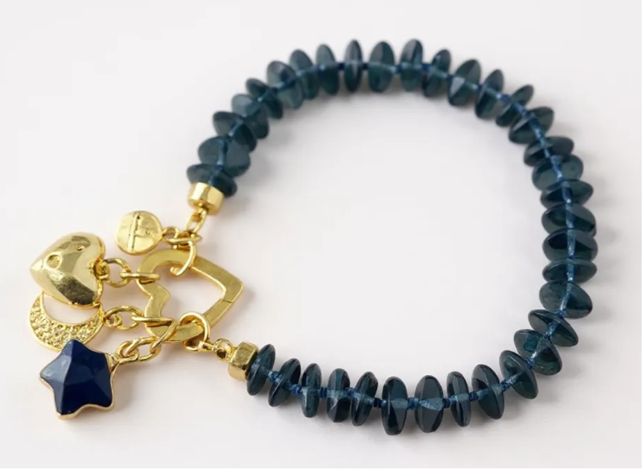London Blue Bracelet: Hand knotted London Blue Topaz faceted gemstone beads Gold heart clasp with Lapis Lazuli star, Pavé moon and CZ accent heart charms OOAK