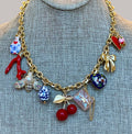 The Jackie Necklace: Tarnish resistant gold chain with various charms in a red pink & blue theme