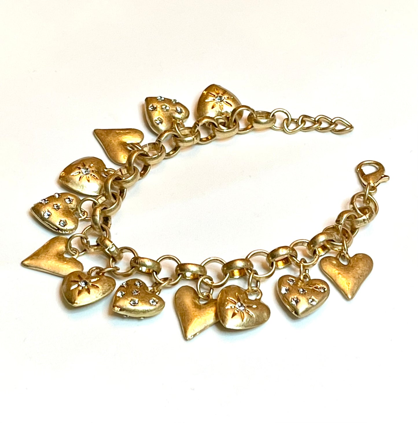 Hearty Charm Bracelet: Gold plated brass Rolo style bracelet with adorable heart charms