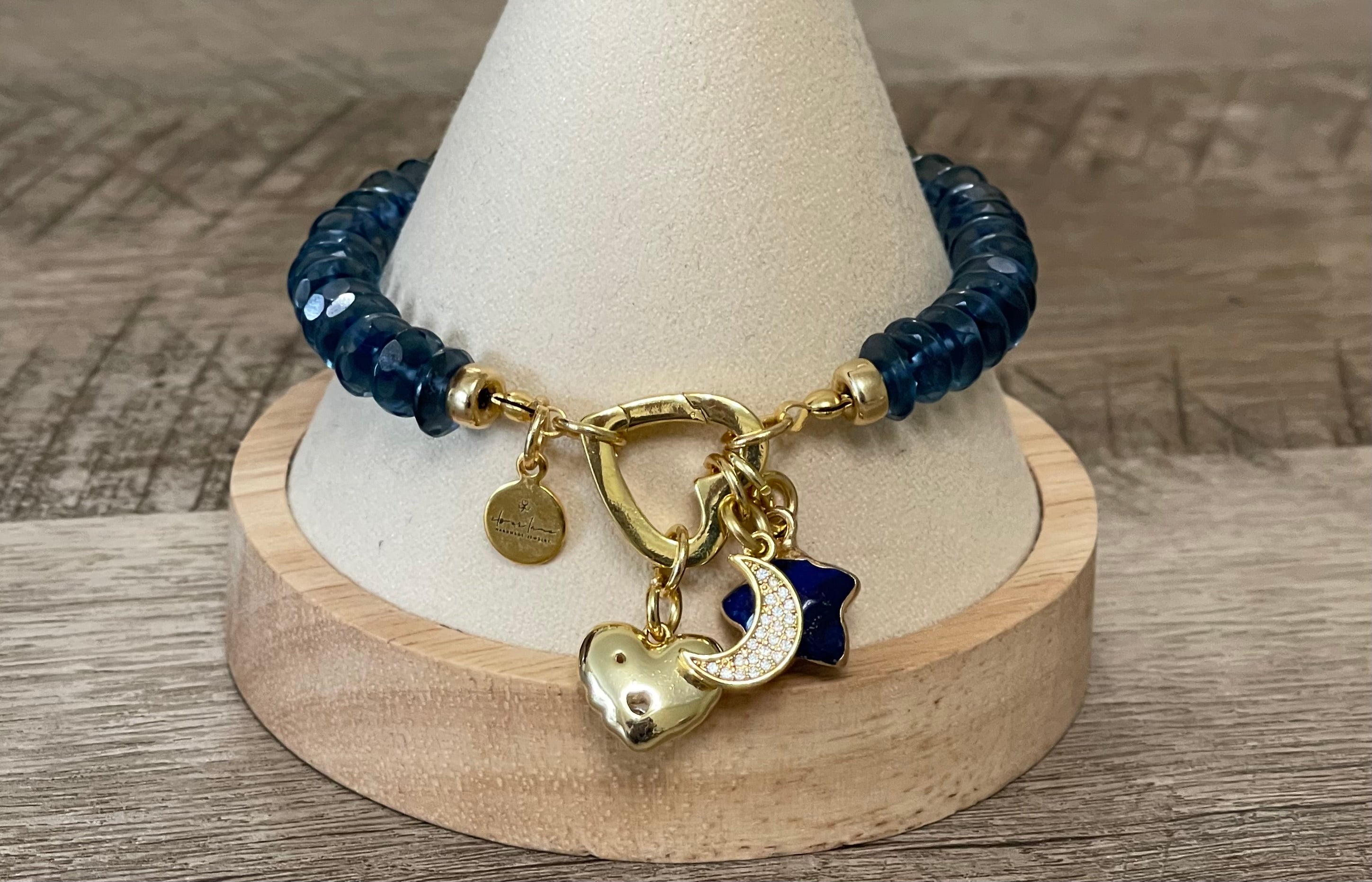 London Blue Bracelet: Hand knotted London Blue Topaz faceted gemstone beads Gold heart clasp with Lapis Lazuli star, Pavé moon and CZ accent heart charms OOAK