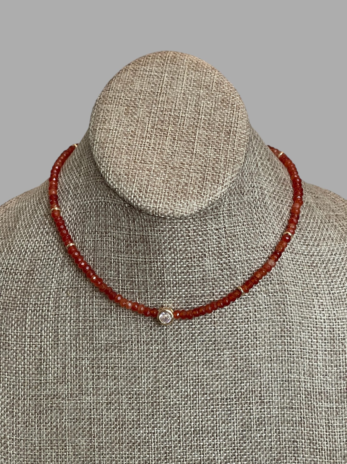 A Little Luxe Necklaces: Various natural stones in many colors, faceted, with a Bezel set Cubic Zirconia centerpiece