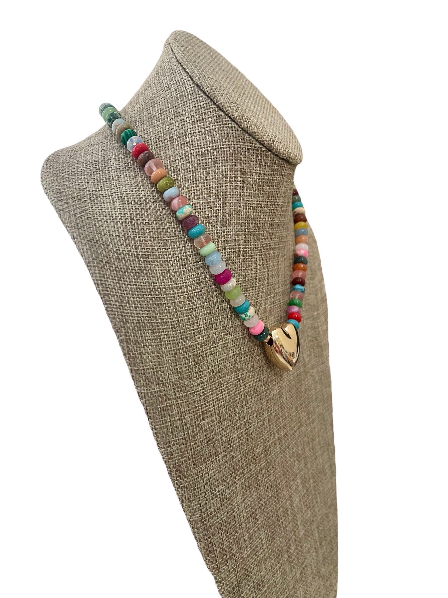 Charming Charlie Necklace: Mixed multi Gemstones providing vibrant colors and versatility Jumbo Gold Heart centerpiece Gold clasp w/ extender OOAK