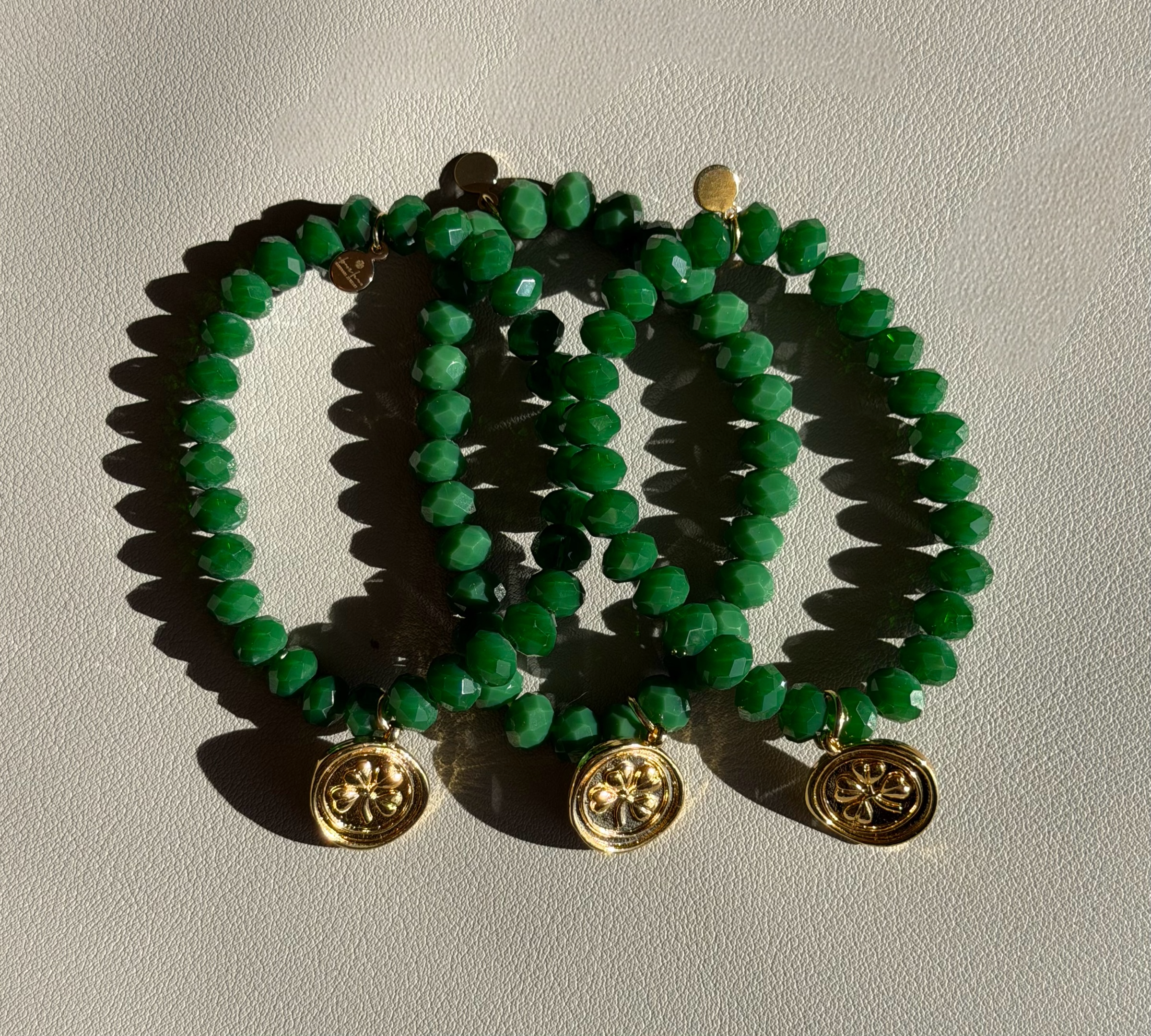 Lucky You Bracelet: Acrylic and glass beads—You choose! Also, Choose from 3 charms to make your bracelet custom 🍀