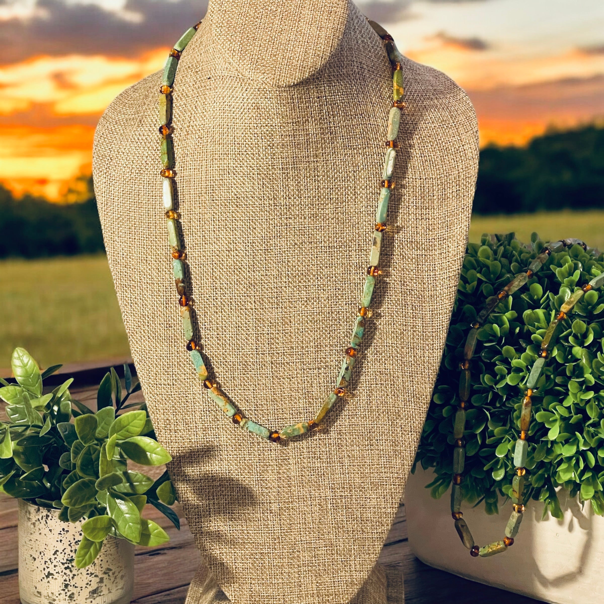Verdant Glow Necklace: Turquoise and Baltic Amber stone with gold toggle clasp