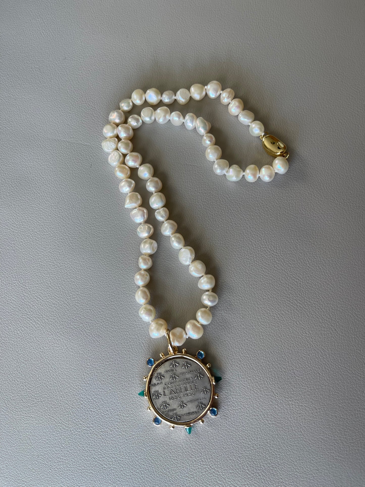 Oui Madame Necklace: Hand Knotted Freshwater Pearls Gold Bean Clasp French Coin Charm w Blue&Green Accents