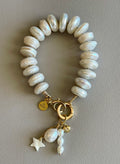 The Haven Bracelet: Coin shaped Pearls Hand-knotted on silk, Gold filled clasp/charm holder