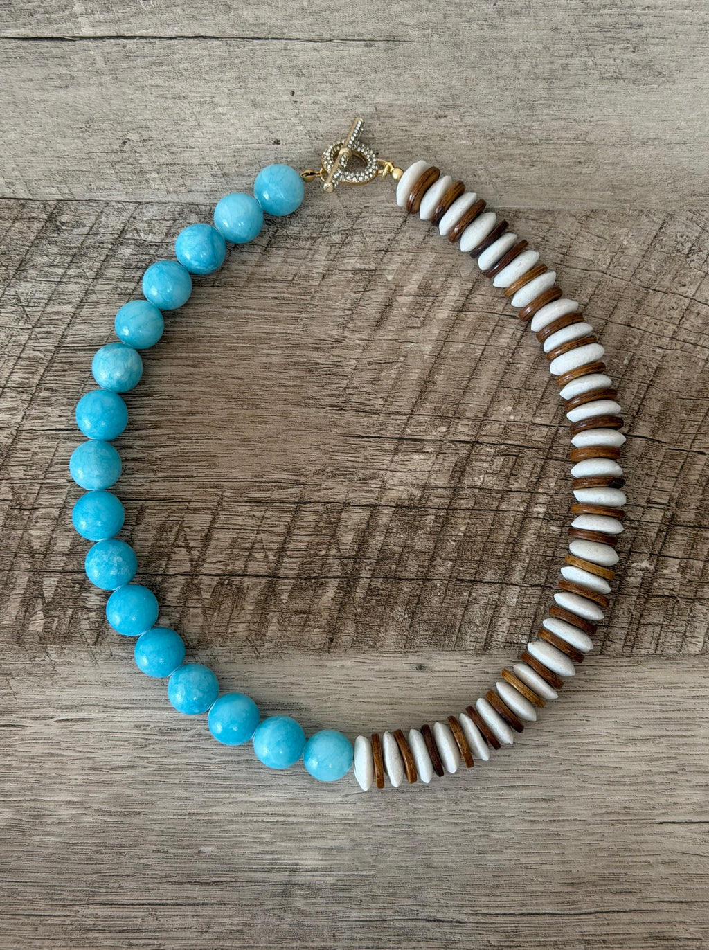 Sky & Timber Necklace: Ashanti glass, wood, and Jade with gold pavé clasp