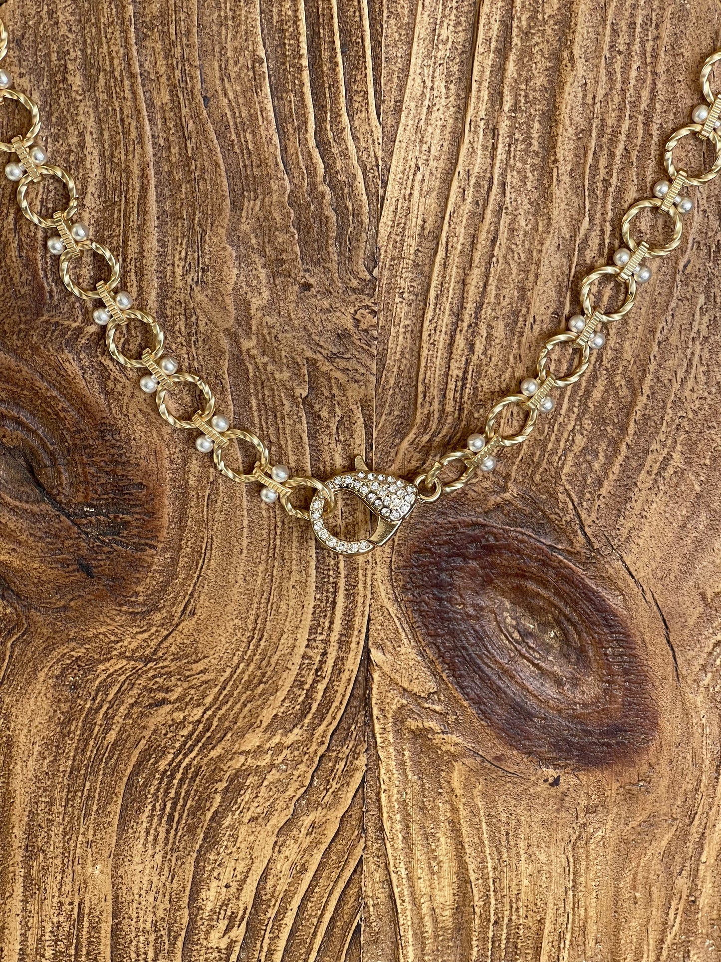 Heather Necklace: Brushed gold circle chain with brushed silver accents and oversized pavé clasp