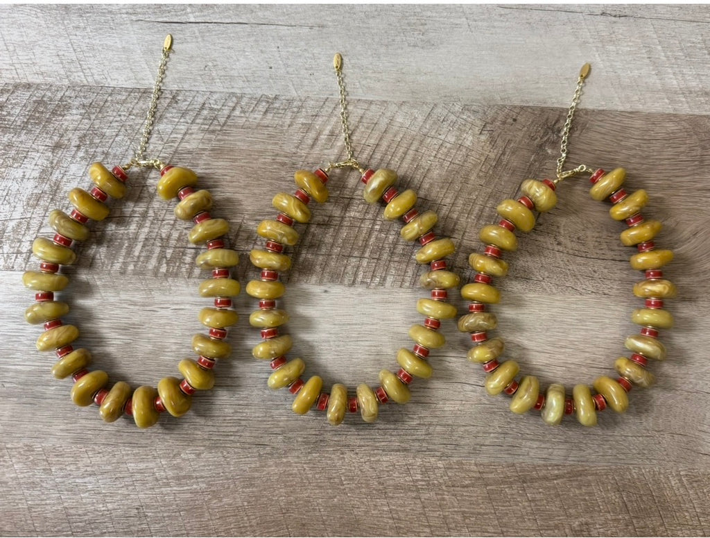 Ochre & Brick: Resin, ceramic & brass beads Gold clasp and extender
