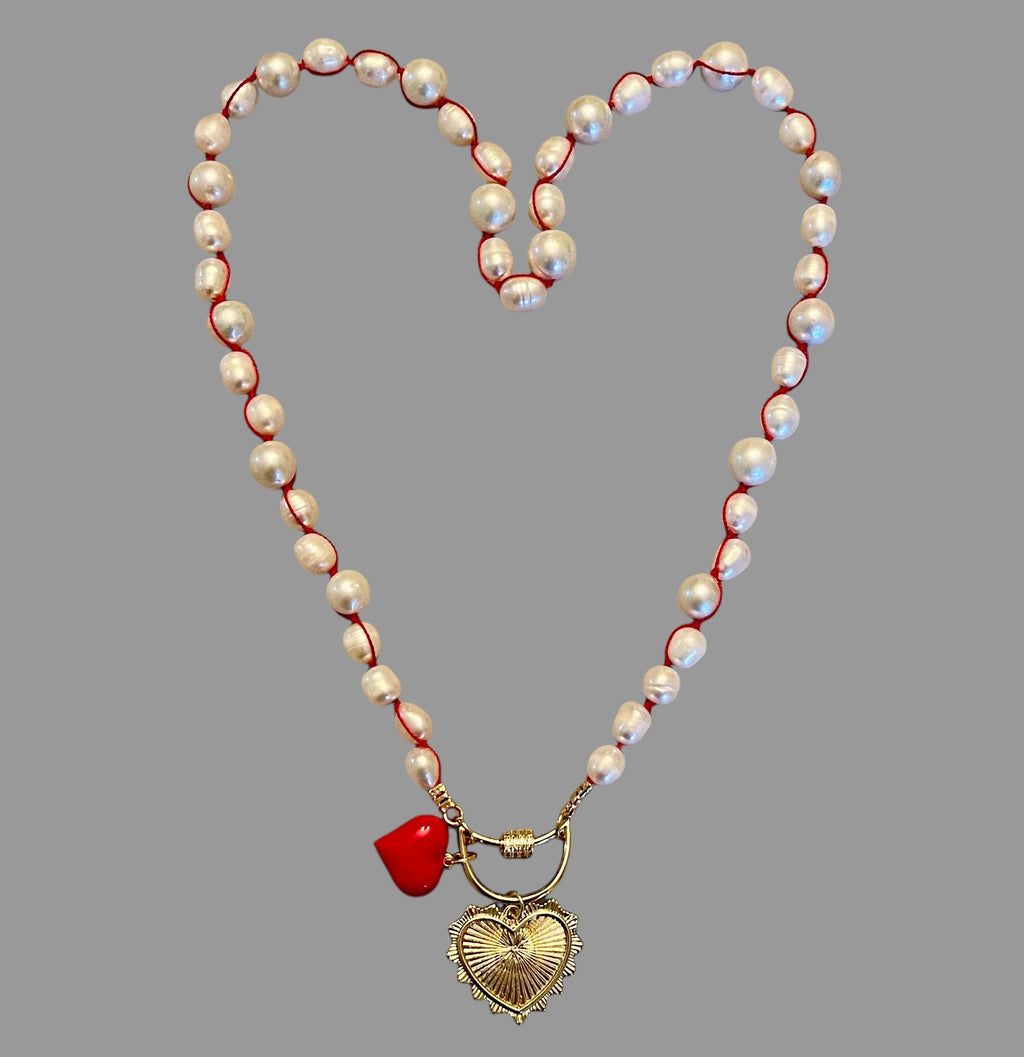The Heartstrings Necklace: Luminous high quality freshwater pearls hand knotted on red silk w/ gold and red enameled heart charms, pavé accented clasp/charm holder OOAK