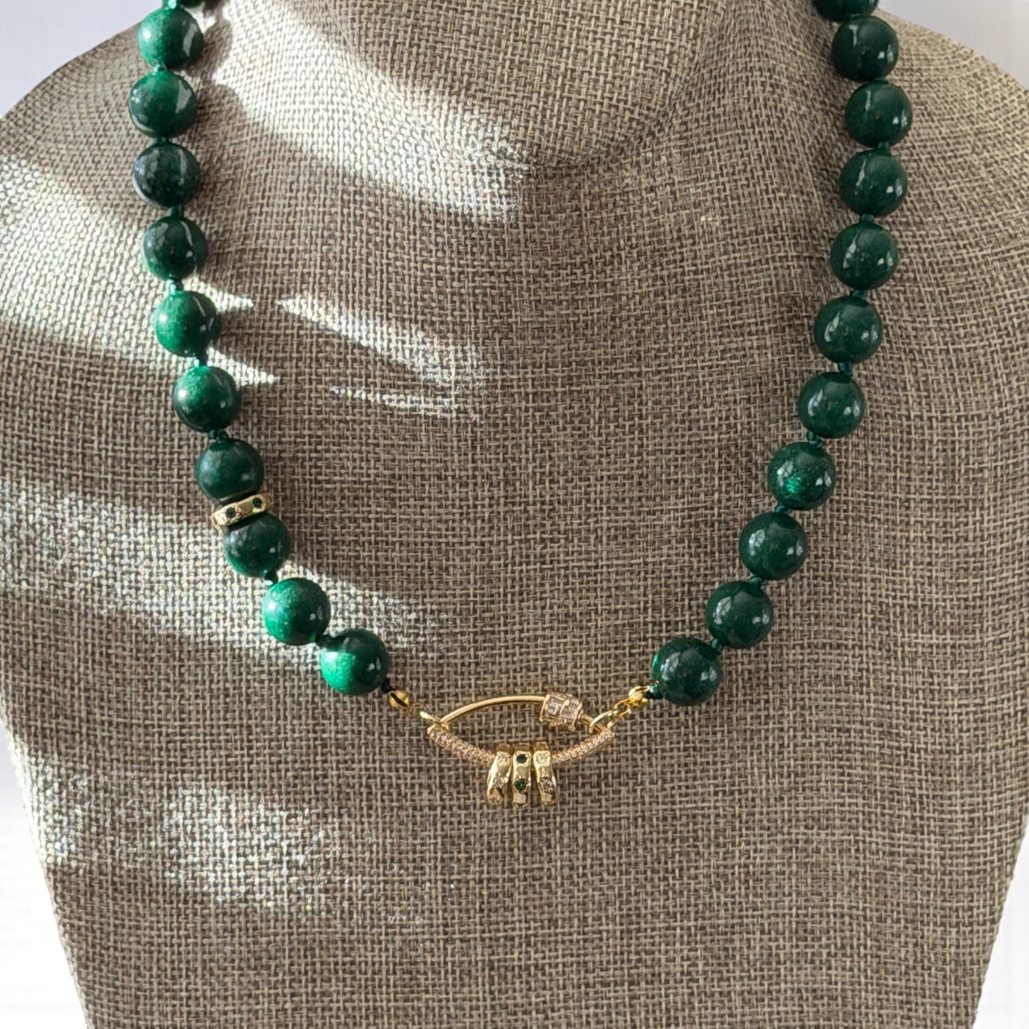 Vintage Vogue Necklace: Vintage Chinese Jade beads hand-knotted on matching satin cord•Gold pavé accents and charms