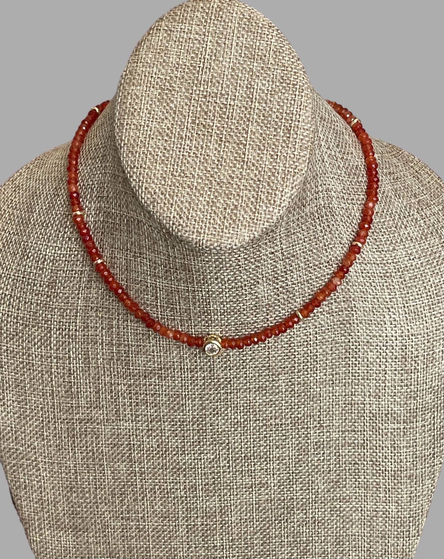 A Little Luxe Necklaces: Various natural stones in many colors, faceted, with a Bezel set Cubic Zirconia centerpiece