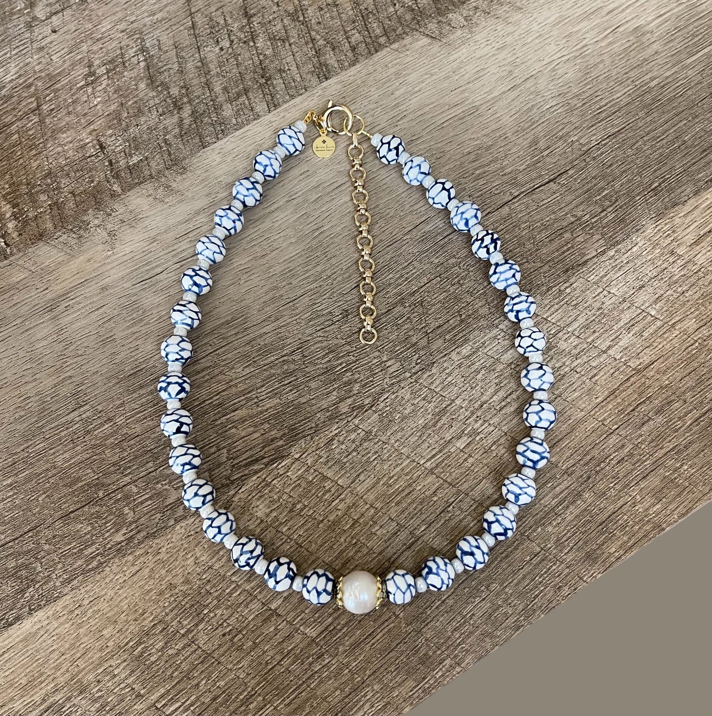 Indigo Lattice Necklace: Blue and white ceramic beads w pearlized glass spacer beads, Baroque Pearl center 14k accents & clasp OOAK