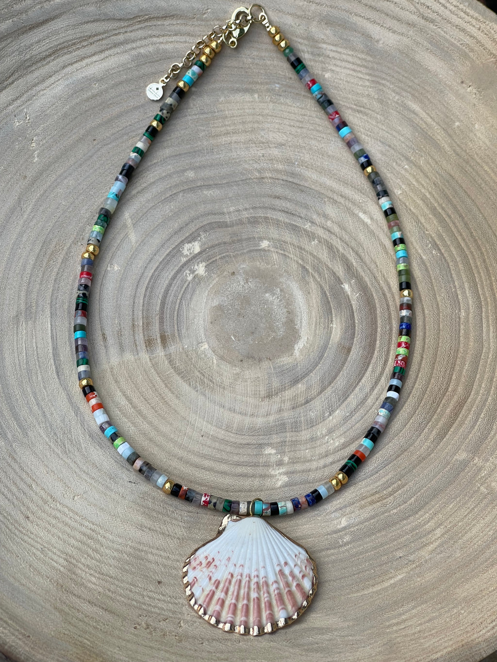 Multi Gem Seashell Necklace: Large variety of natural gemstone beads gold accents Natural seashell pendant