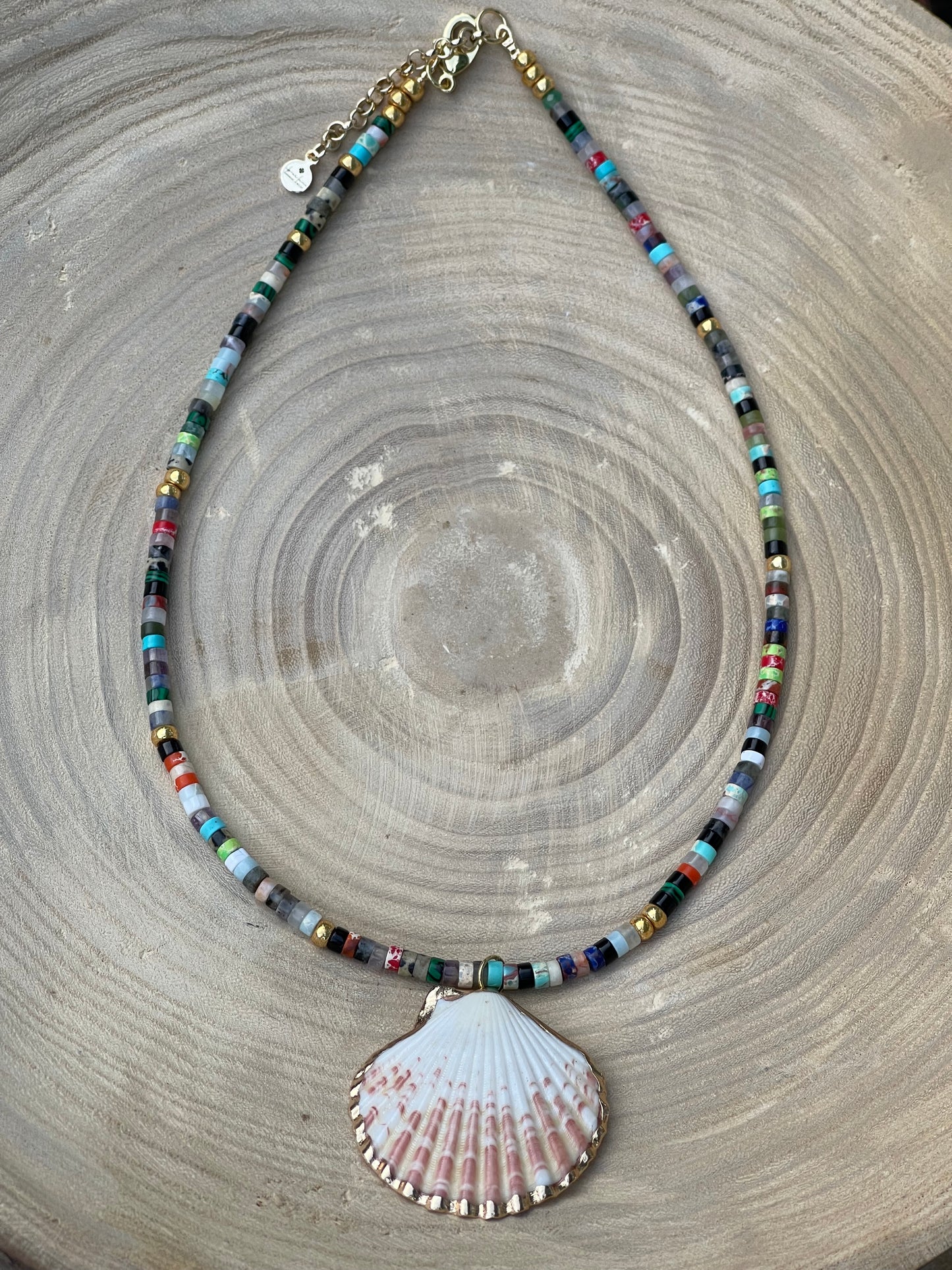 Multi Gem Seashell Necklace: Large variety of natural gemstone beads gold accents Natural seashell pendant
