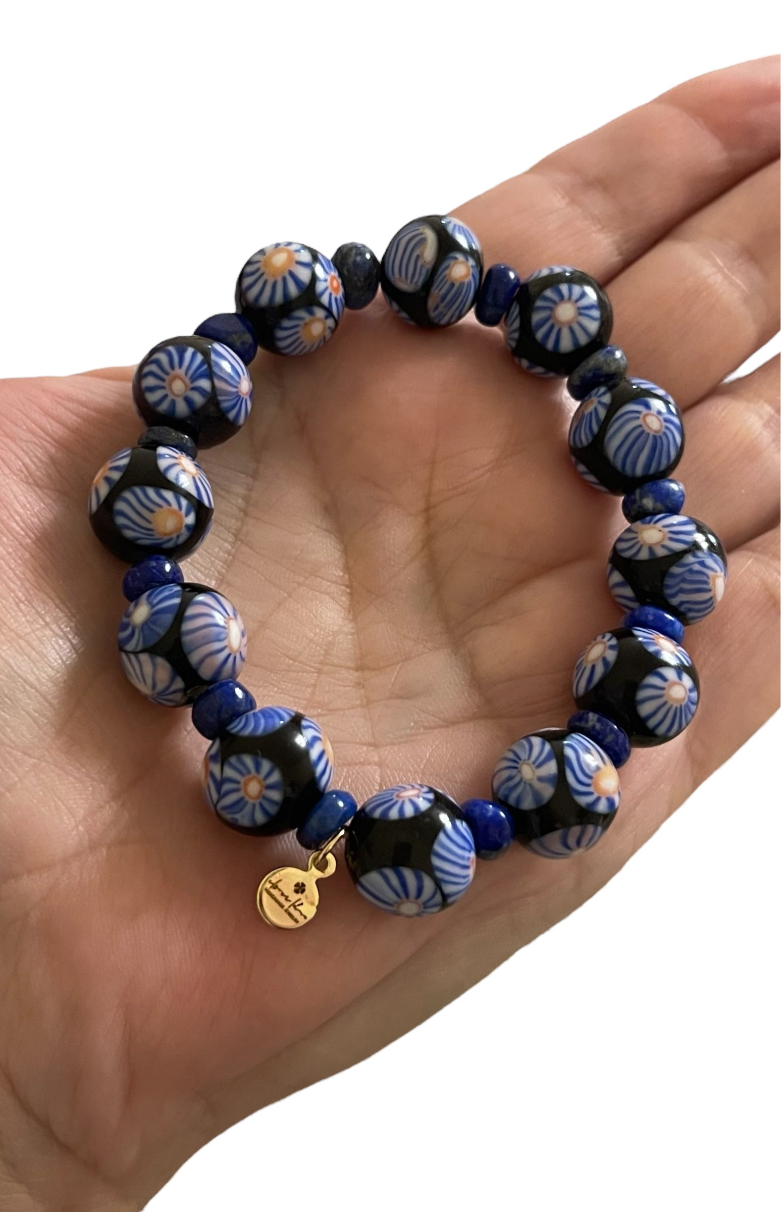 Midnight Bloom Bracelet: Hand patterned Millifiori Javanese Glass beads on Stretch elastic cord, Lapis Lazuli spacer beads OOAK