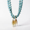 The Golden Catch Necklace: Sea blue Jade with Gold Fish Charms