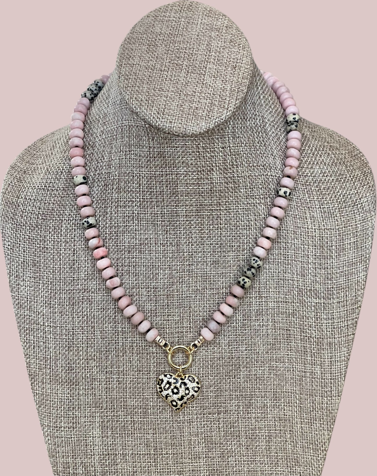 The Pink Leopard Necklace: Natural matte pink opals hand knotted on black silk w Dalmatian Jasper accents Gold pavé leopard heart OOAK