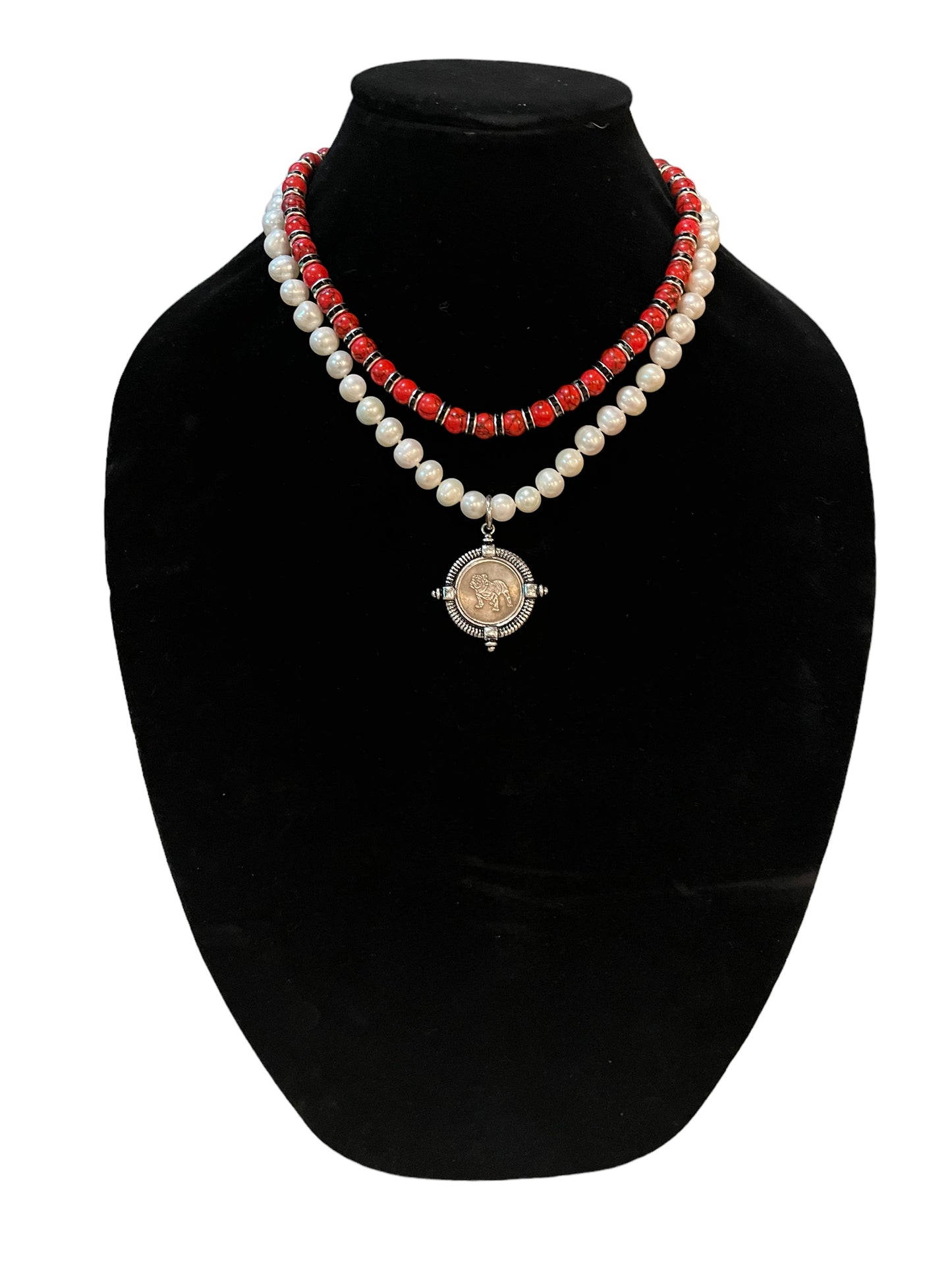 Go Dawgs Necklace: Hand-knotted Freshwater Pearls layered with Red & black marbled beads accented by black sparkling spacer beads and a chic coin-style Bulldog pendant Pinch clasp