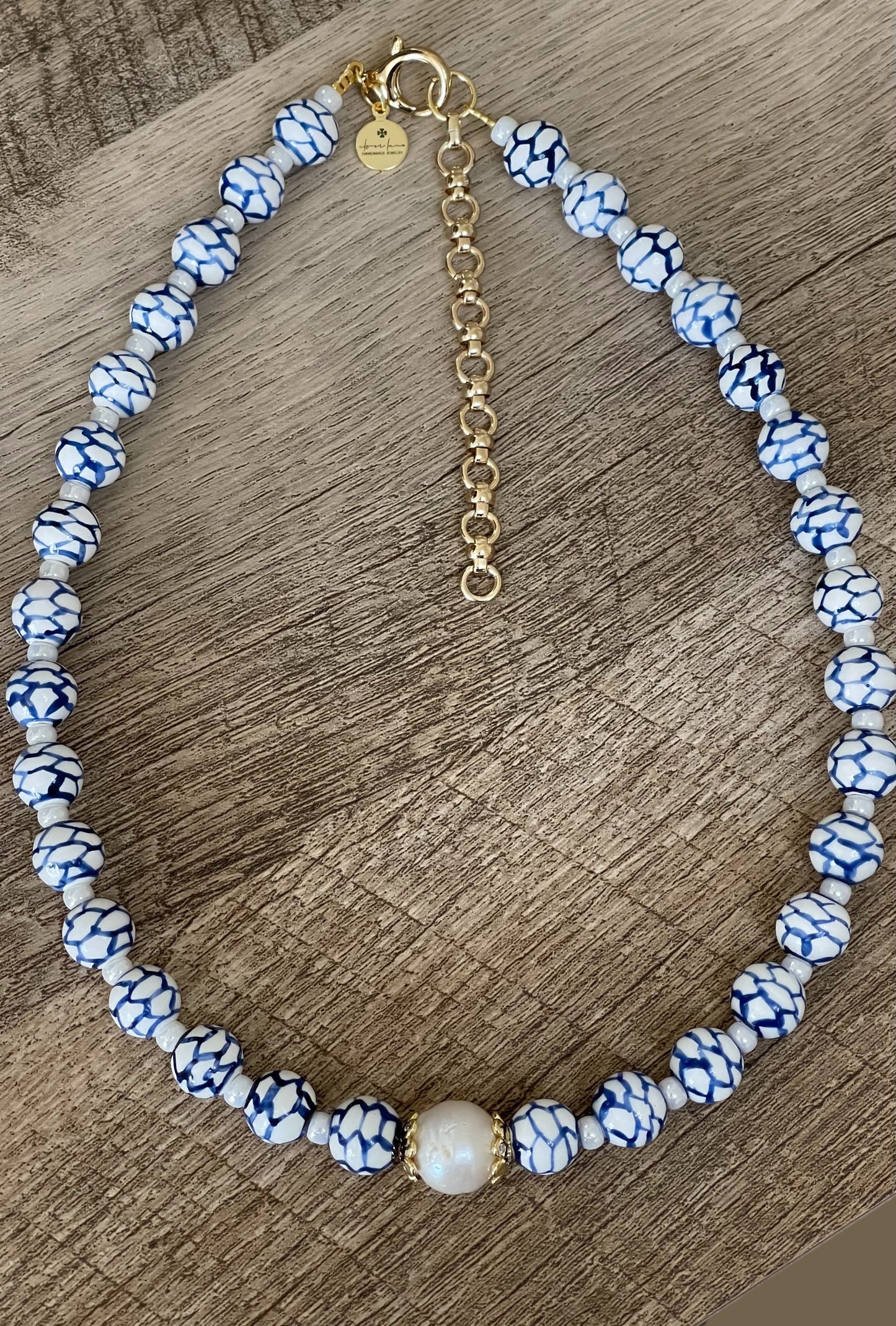 Indigo Lattice Necklace: Blue and white ceramic beads w pearlized glass spacer beads, Baroque Pearl center 14k accents & clasp OOAK