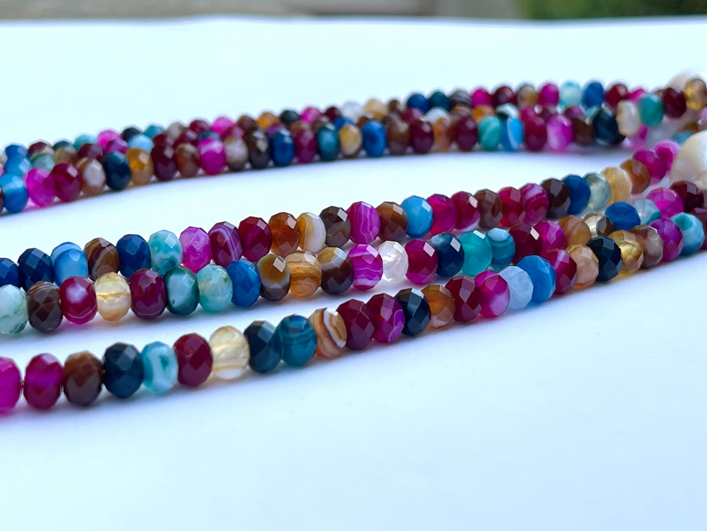 Jewel Toned Jen Necklace: African Mixed Banded Agate Diamond-Cut Beads with a Baroque Pearl Centerpiece