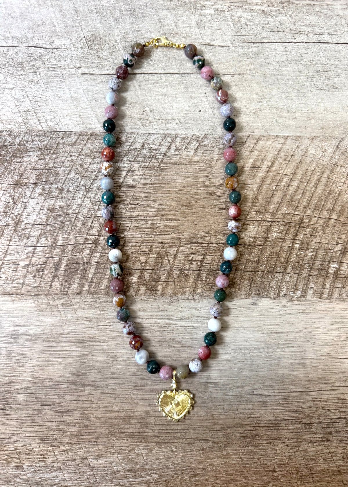 Heart & Soul Necklace: Faceted Ocean Jasper handknotted on deep burgundy. Removable gold heart