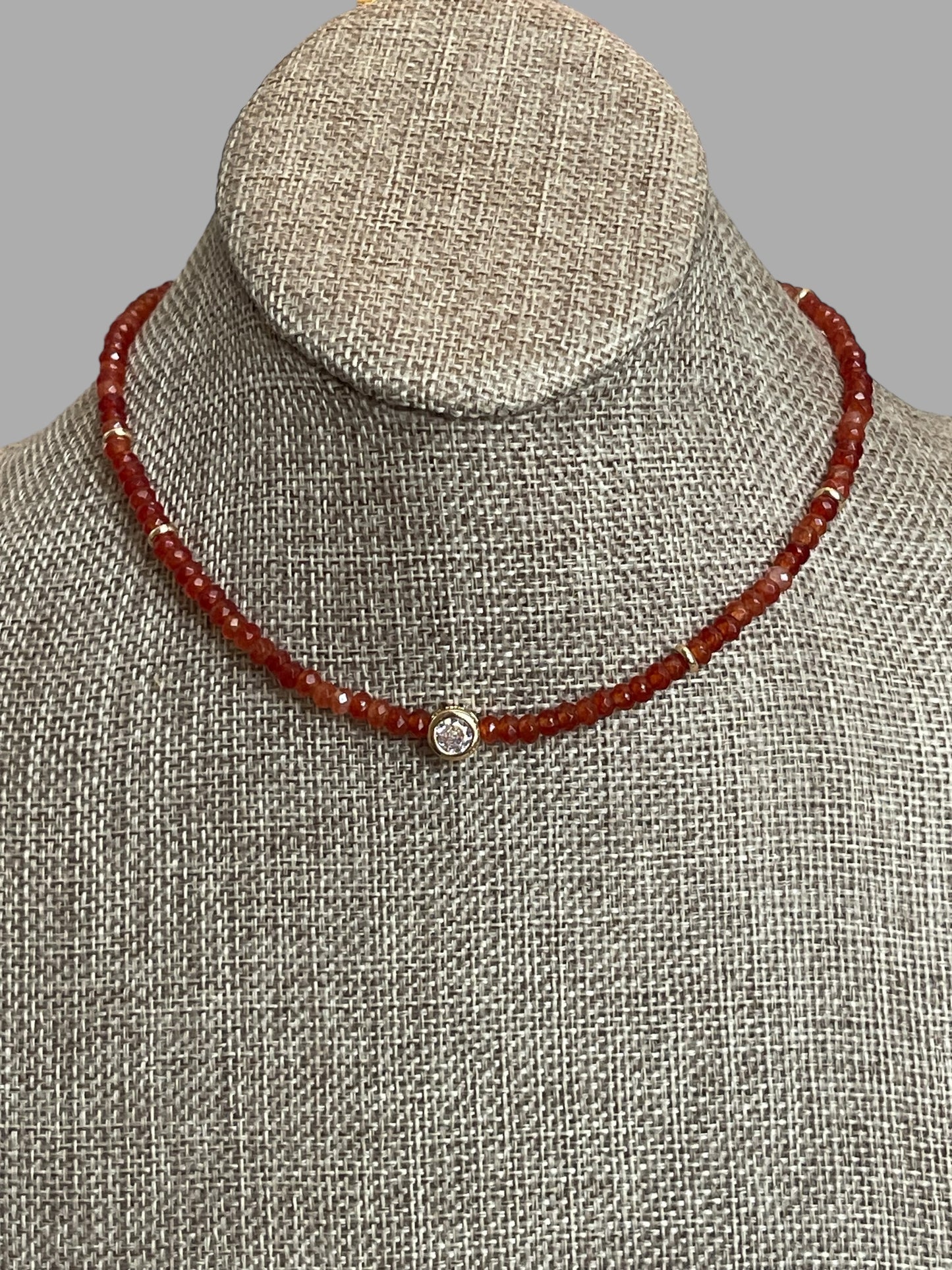 A Little Luxe Necklaces: Various natural stones in many colors, faceted, with a Bezel set Cubic Zirconia centerpiece