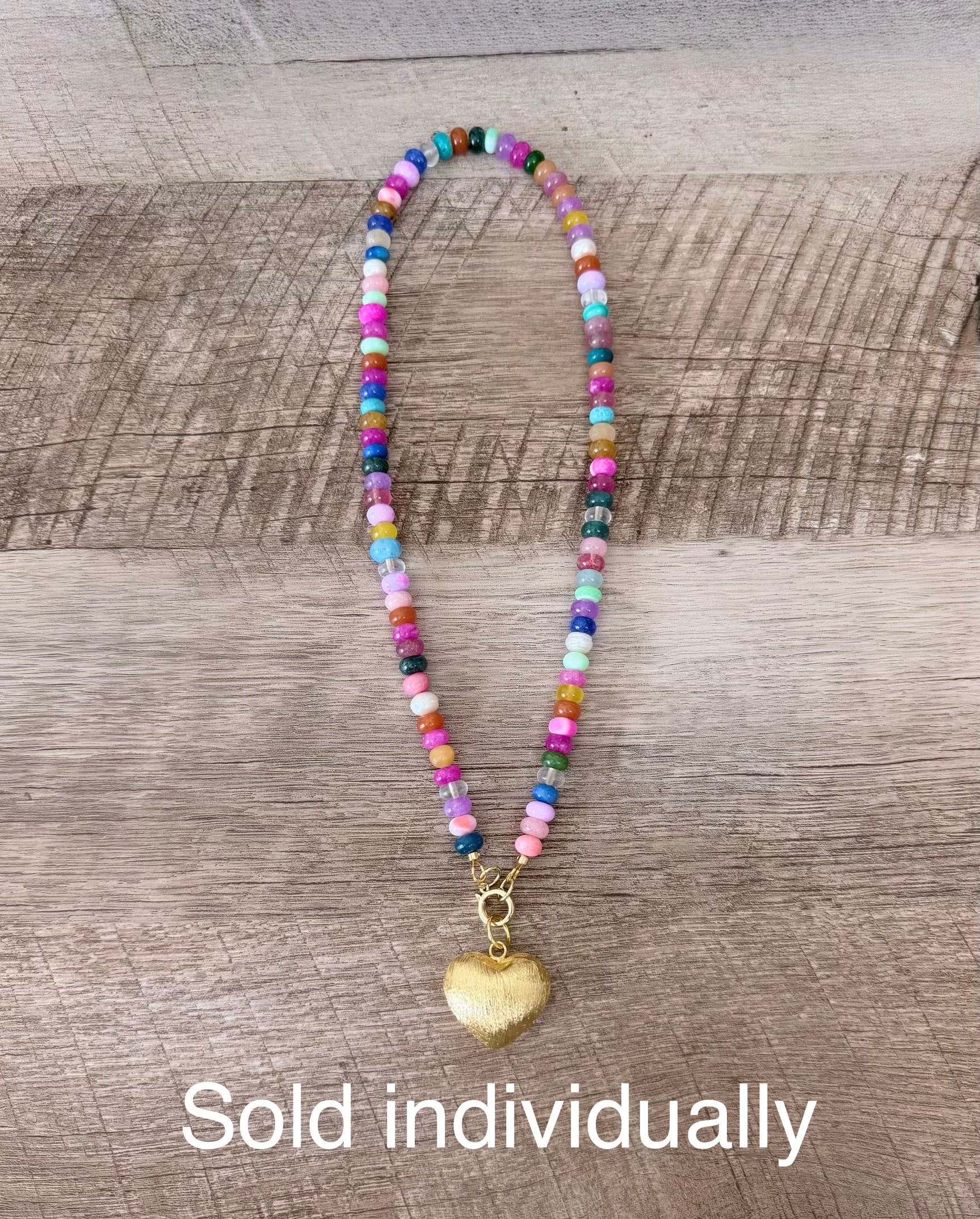 Colorful Claire Necklace: Mixed gemstones and a textured puffed heart pendant