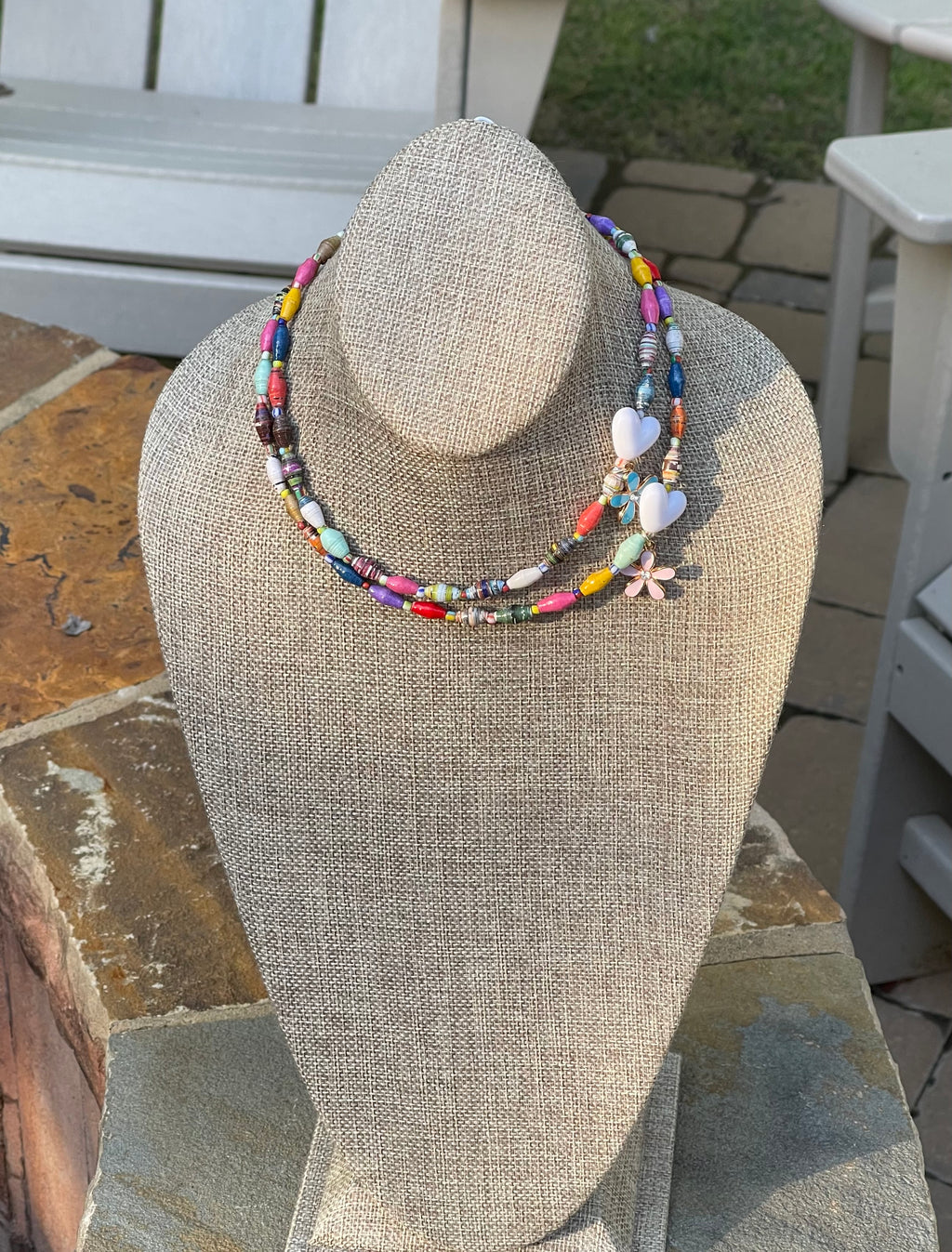 Kindred Colors Necklace: Unique beads handmade in Uganda from recycled paper, glass & acrylic accent beads and a brass flower charm