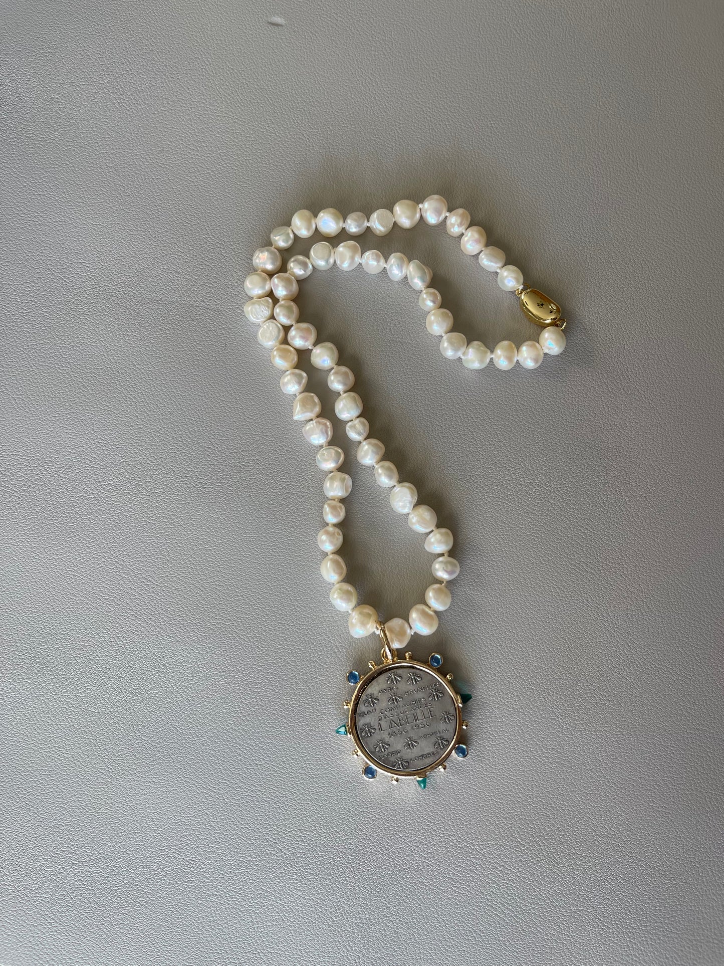 Oui Madame Necklace: Hand Knotted Freshwater Pearls Gold Bean Clasp French Coin Charm w Blue&Green Accents