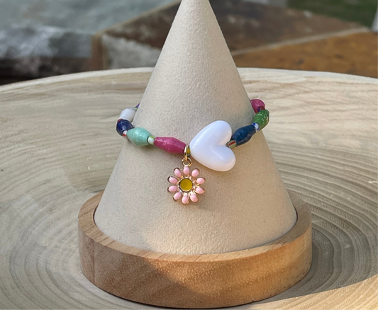 Kindred Colors Bracelet: Recycled paper bicone shaped beads, glass spacer beads, shiny white heart and flower charm