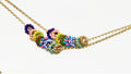The Inner Circle Necklace: A Gold Filled diamond cut cable chain w/ mini glass bead circle charms