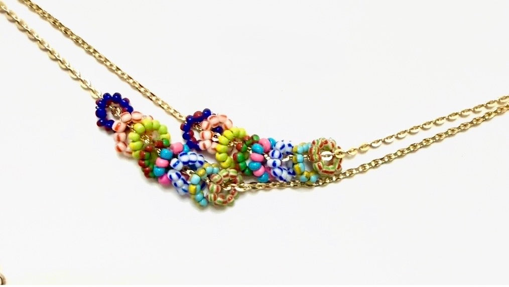 The Inner Circle Necklace: A Gold Filled diamond cut cable chain w/ mini glass bead circle charms