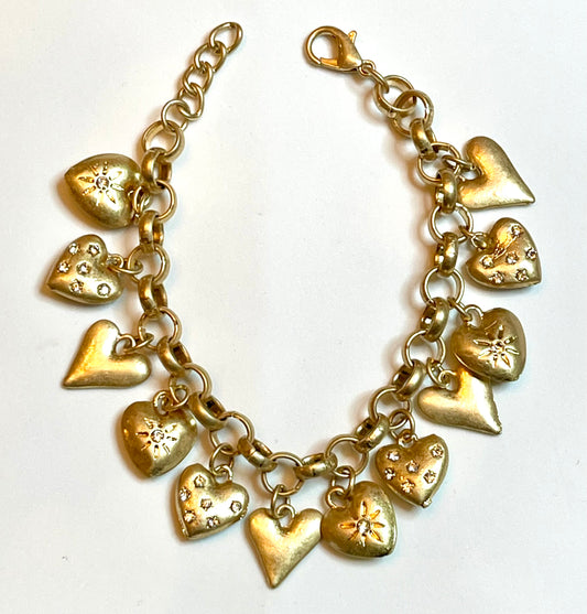 Hearty Charm Bracelet: Gold plated brass Rolo style bracelet with adorable heart charms