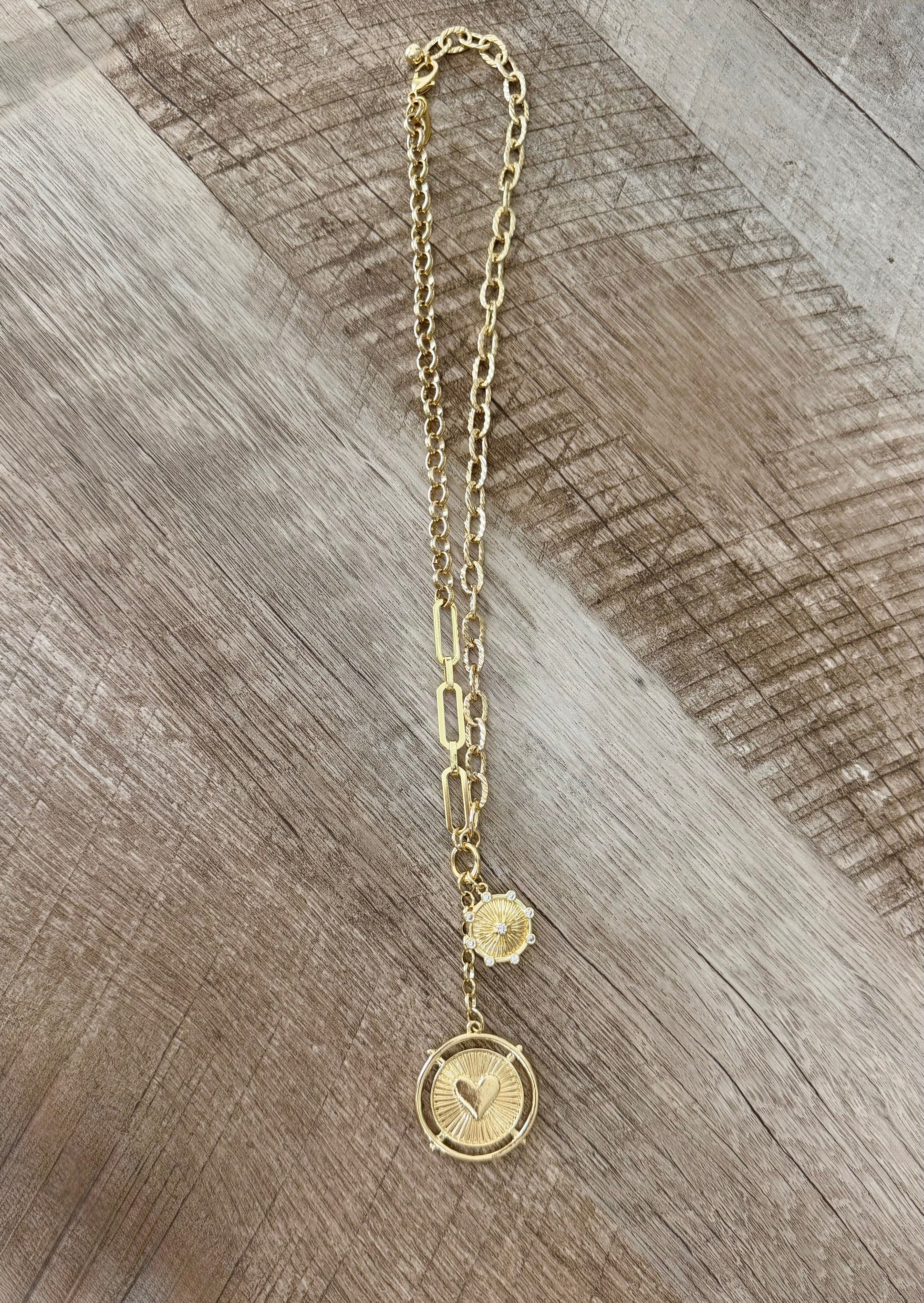 The Beloved Necklace: varying chains come together with two unique pendants