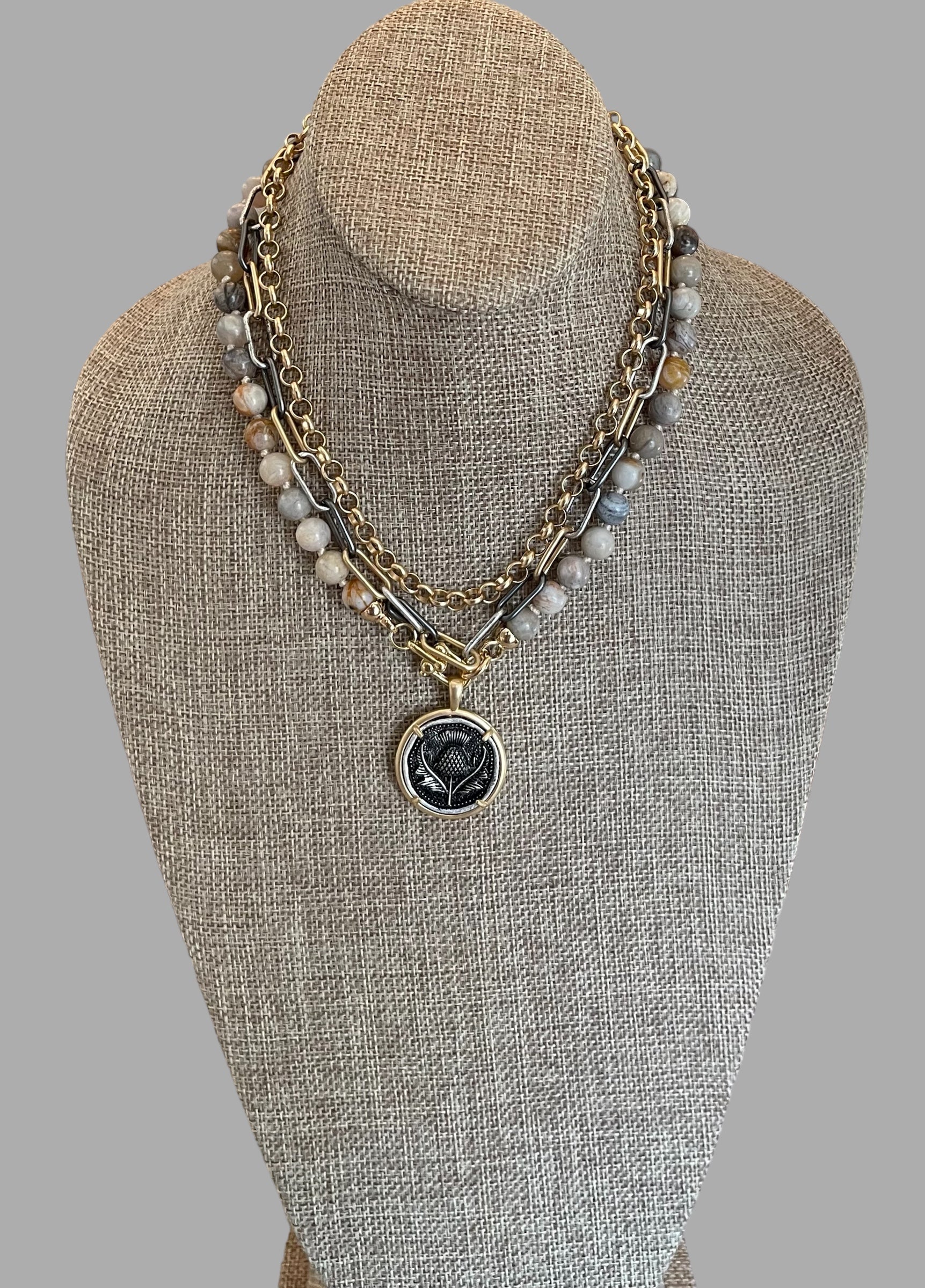 Double Chain Layering Necklace: A brushed gold Rolo chain and a Tri-tone Paperclip chain