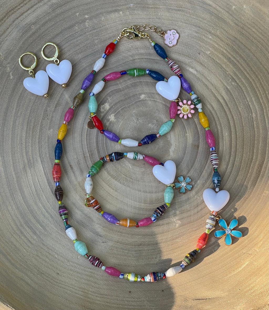 Kindred Colors Bracelet: Recycled paper bicone shaped beads, glass spacer beads, shiny white heart and flower charm