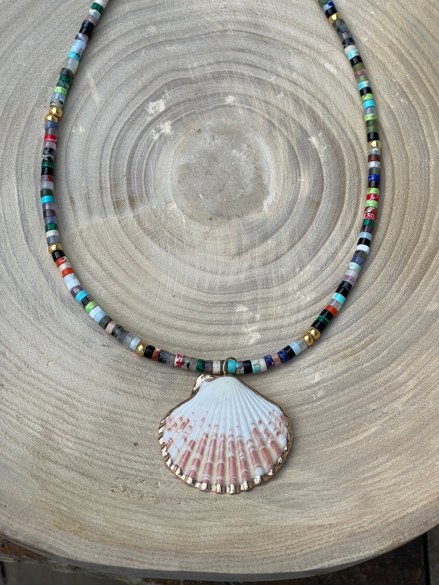 Multi Gem Seashell Necklace: Large variety of natural gemstone beads gold accents Natural seashell pendant