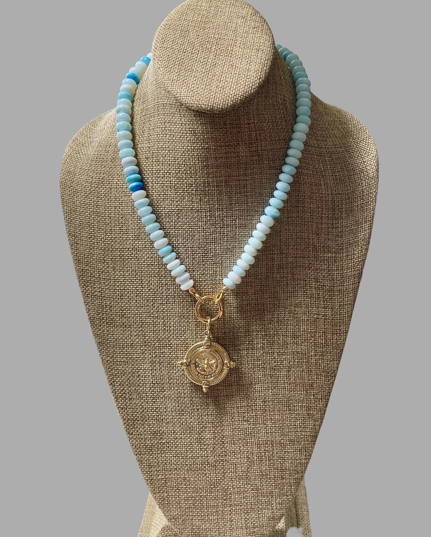 The Skylar Necklace: Sky Blue Opals with a Gold Circle Clasp and French Bee Coin Style Charm