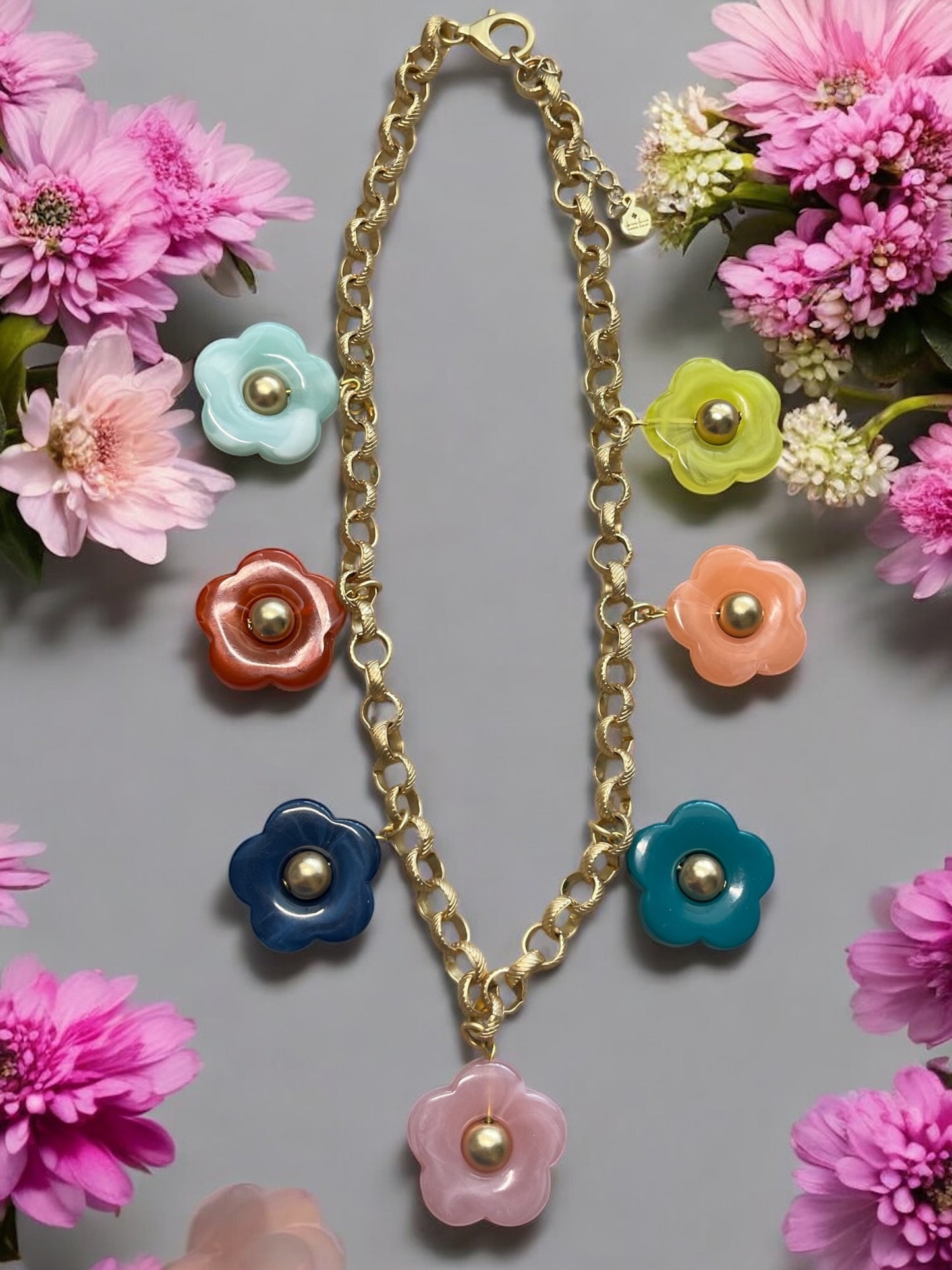 Bloom Necklace: Acrylic flowers with brushed gold centers on a brushed gold Rolo chain