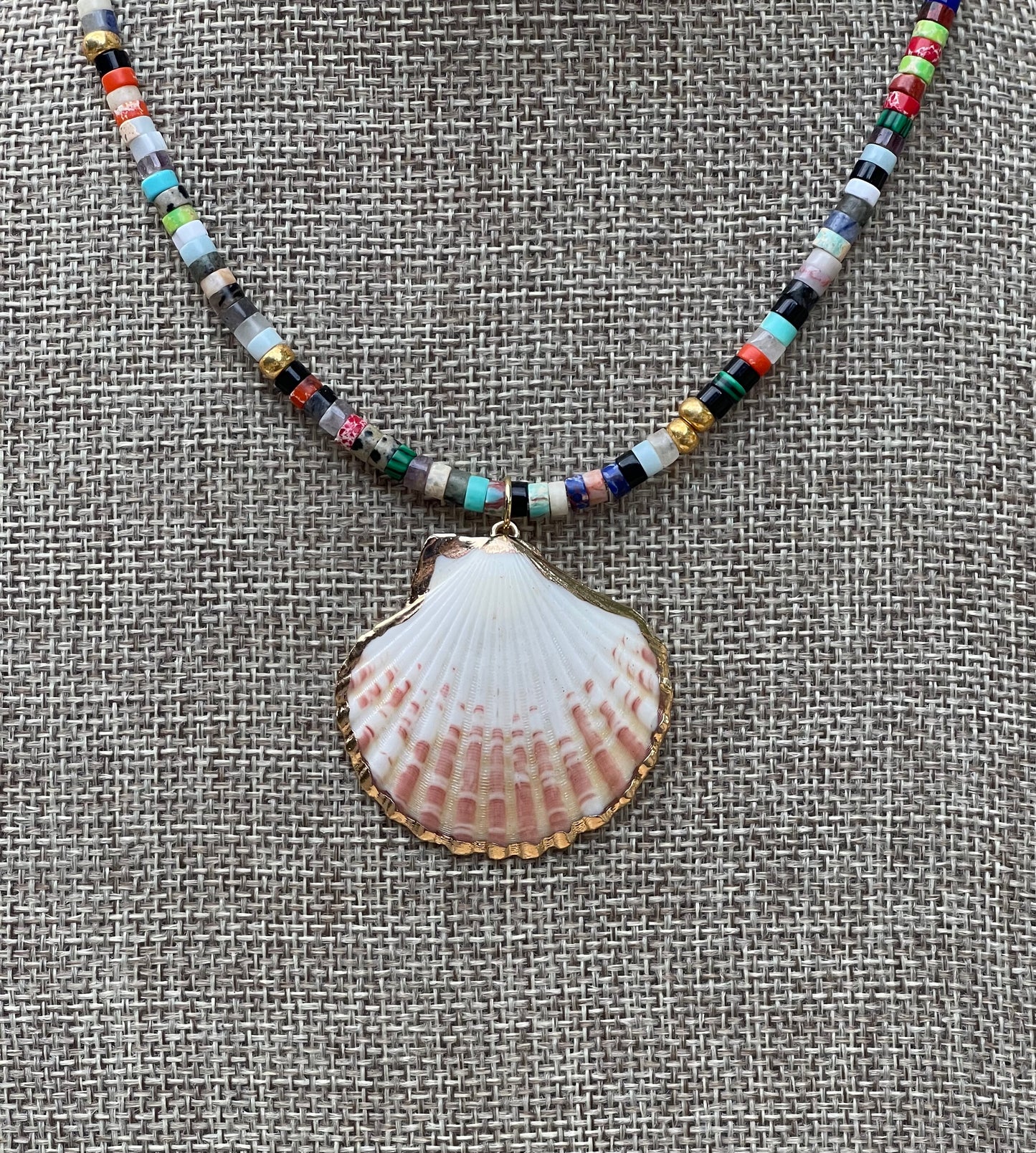 Multi Gem Seashell Necklace: Large variety of natural gemstone beads gold accents Natural seashell pendant
