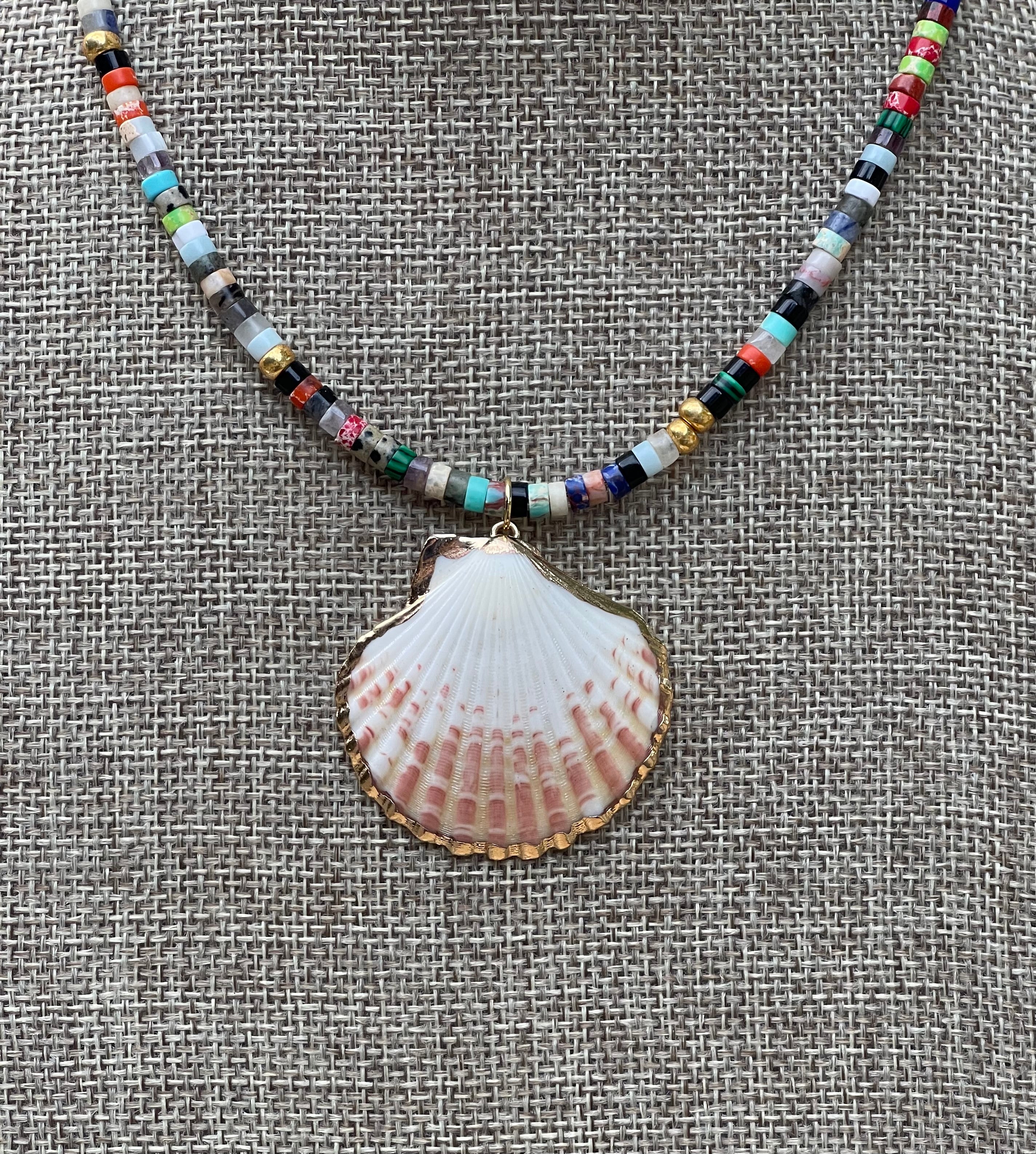Multi Gem Seashell Necklace: Large variety of natural gemstone beads gold accents Natural seashell pendant