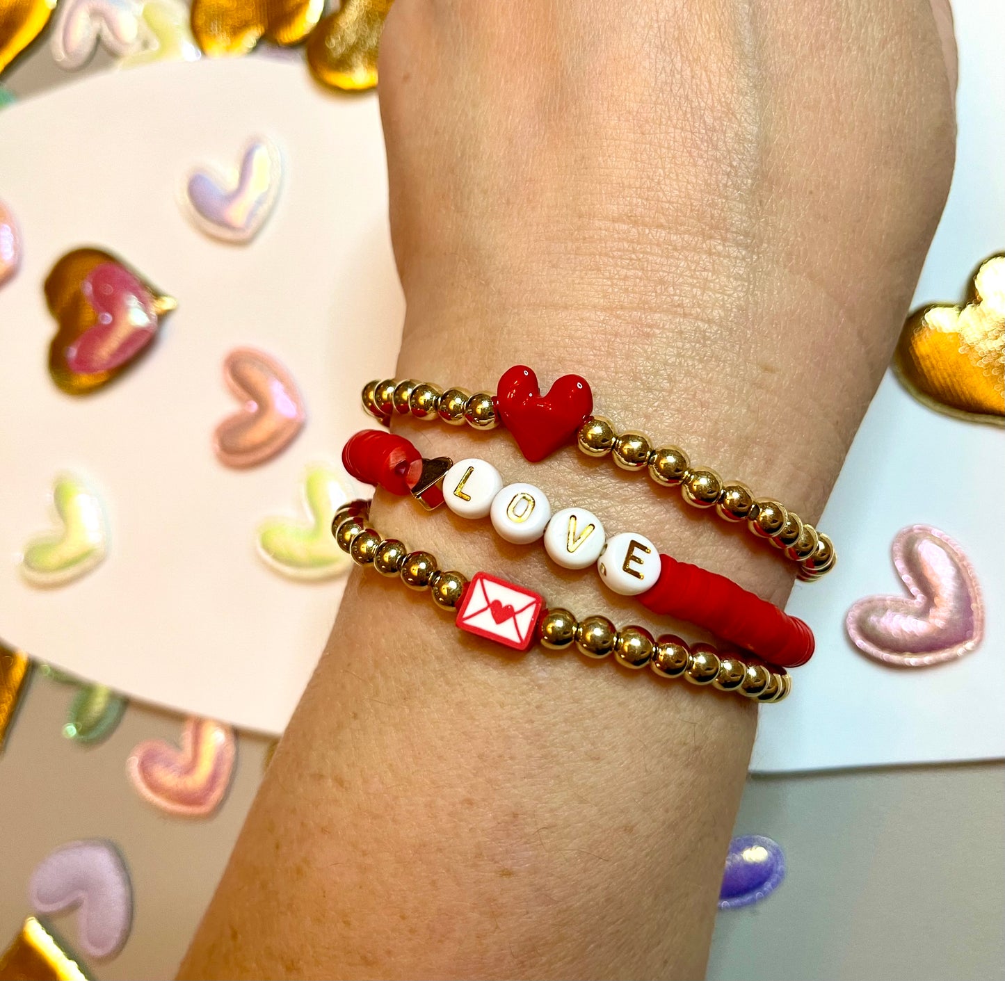 Love Stack 4: OOAK! Two gold plated bead bracelets with center charm and a red clay bracelet with letter beads